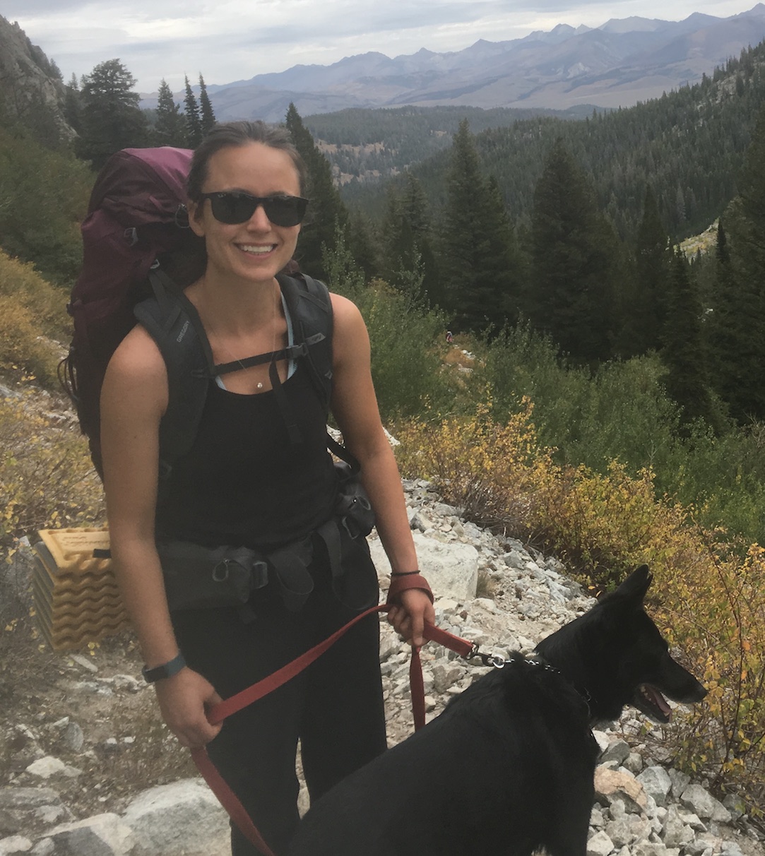 lady with her dog hiking
