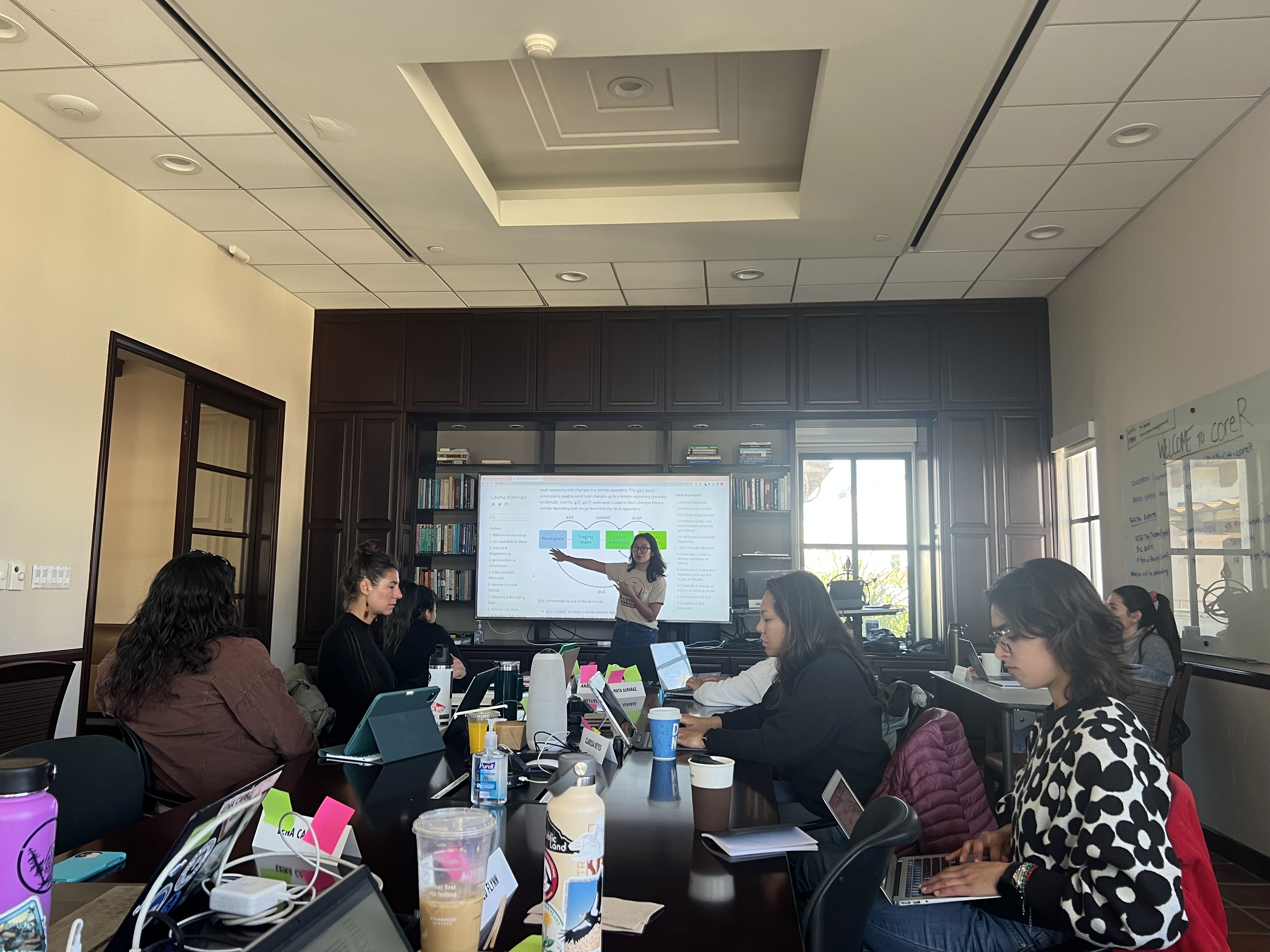 Halina Do-Linh leads a lesson on Git and Github on the first day of the April 2023 coreR course.