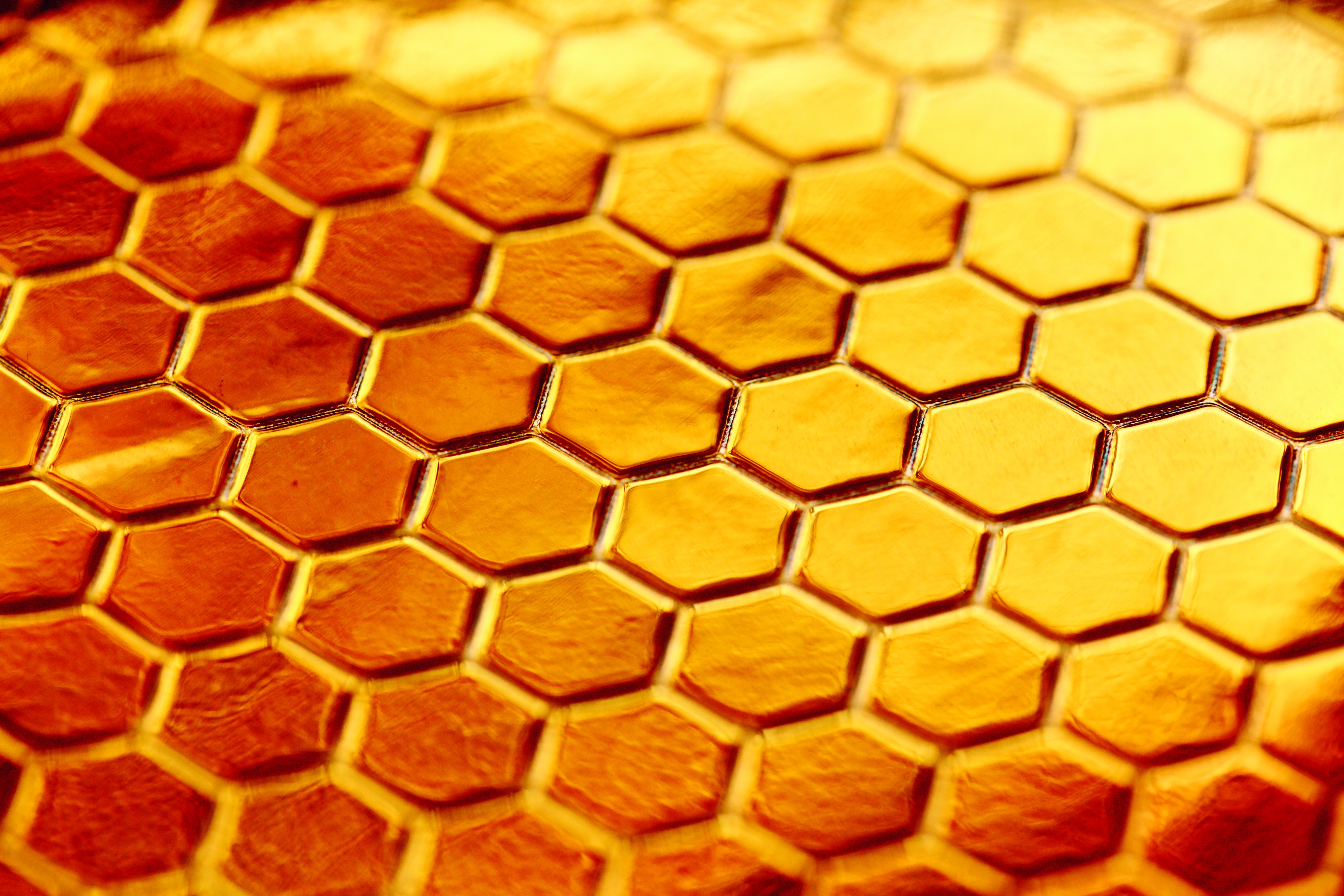 Shiny honey in hexagons