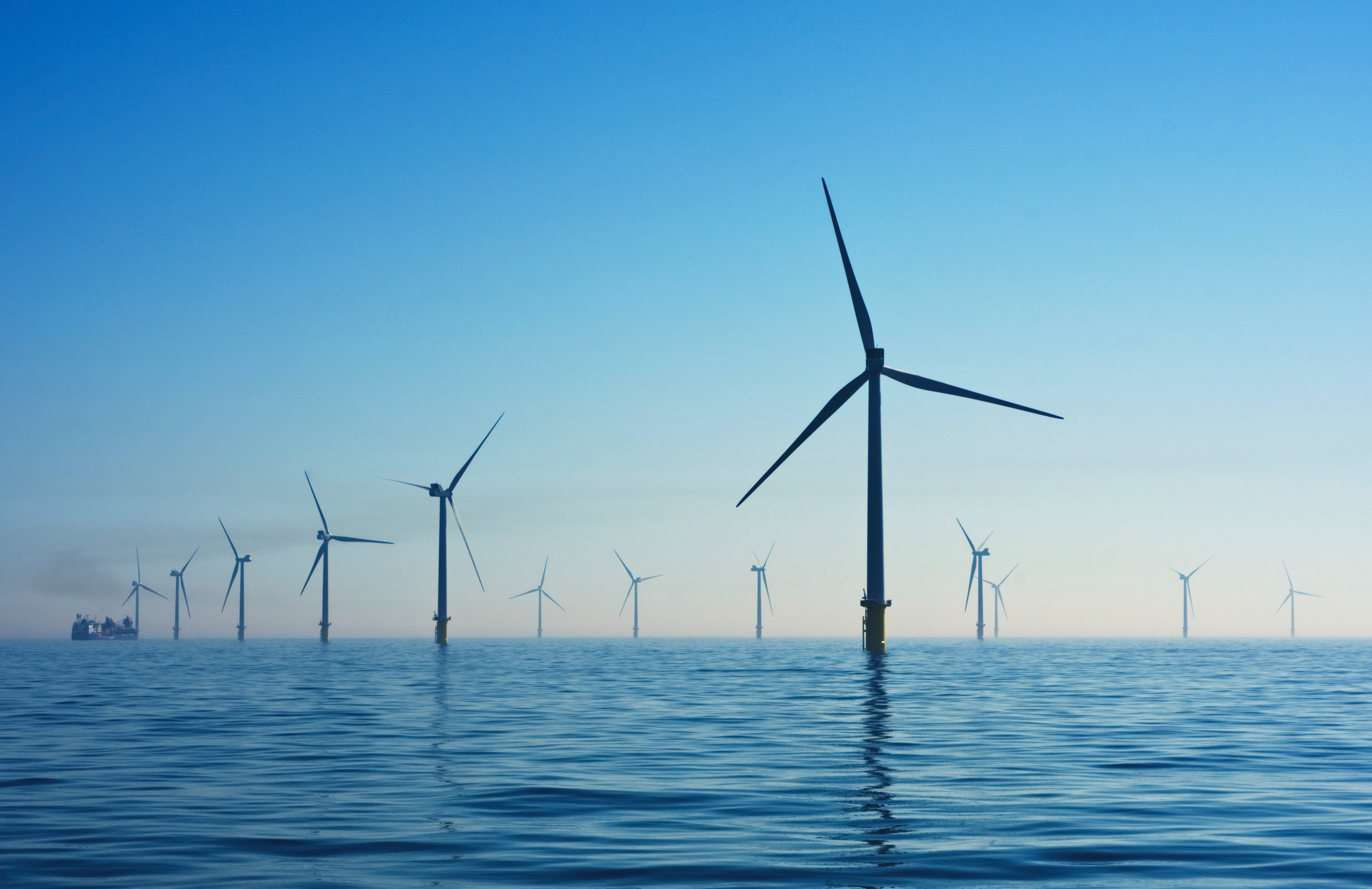 A wind turbine off the coast in the United Kingdom