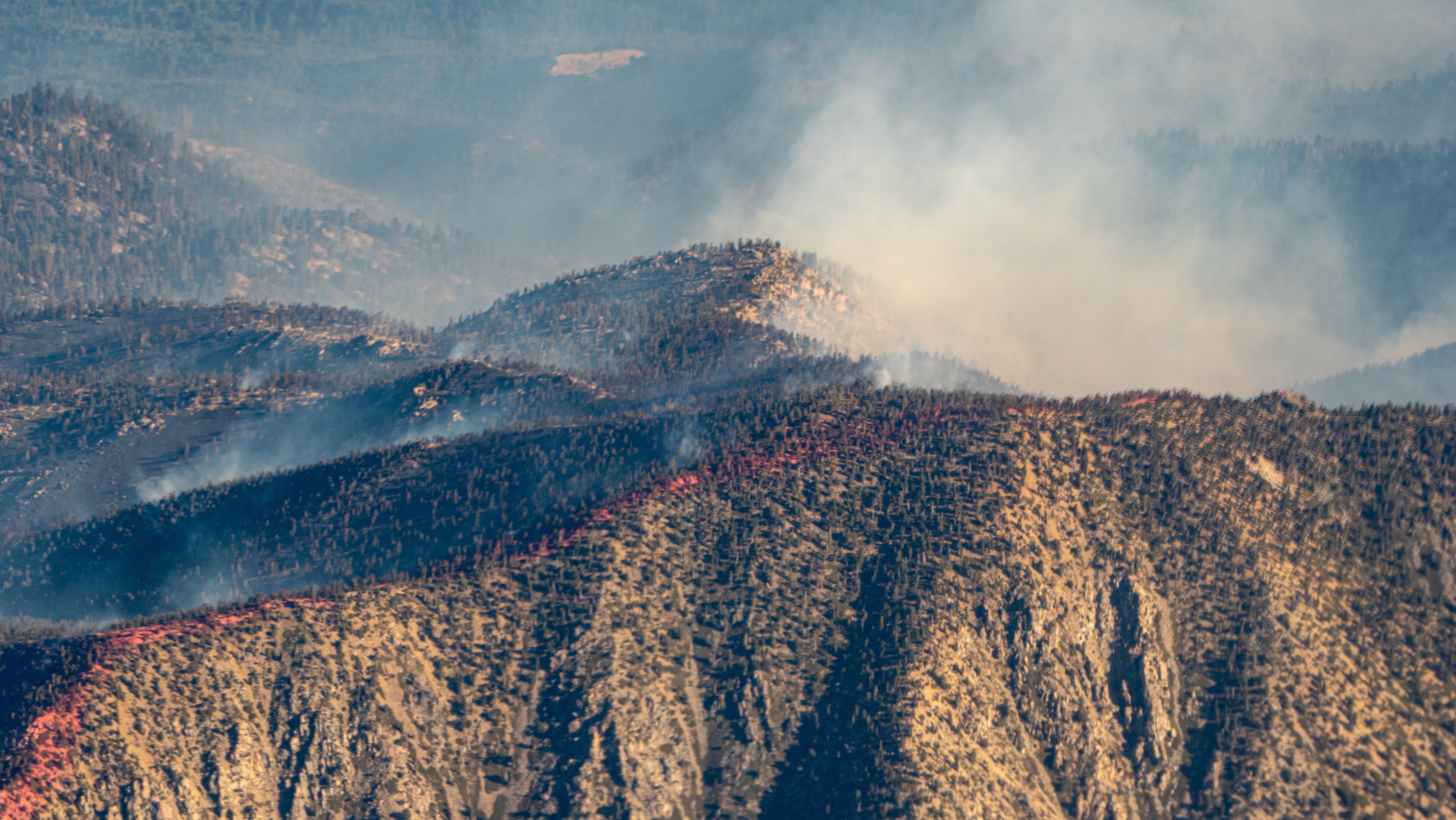 A controlled burn on the CA mountains