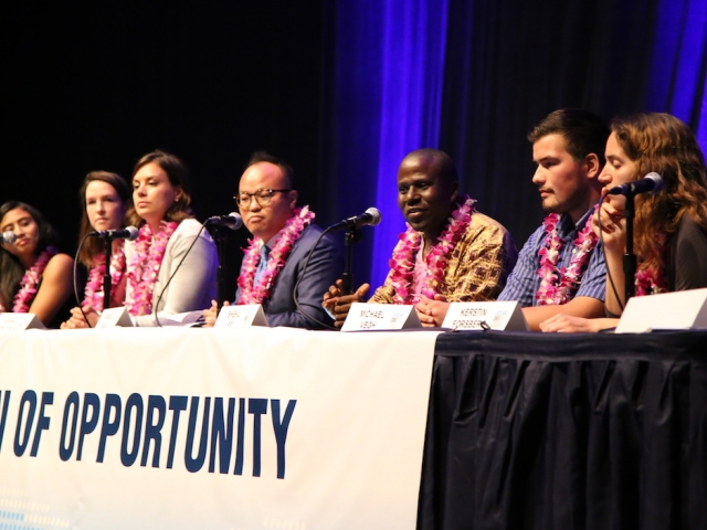 Panel of people at a table