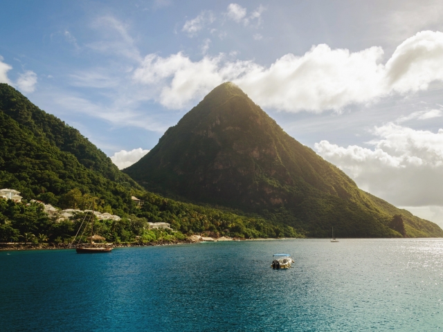 Island mountain with boats in the water