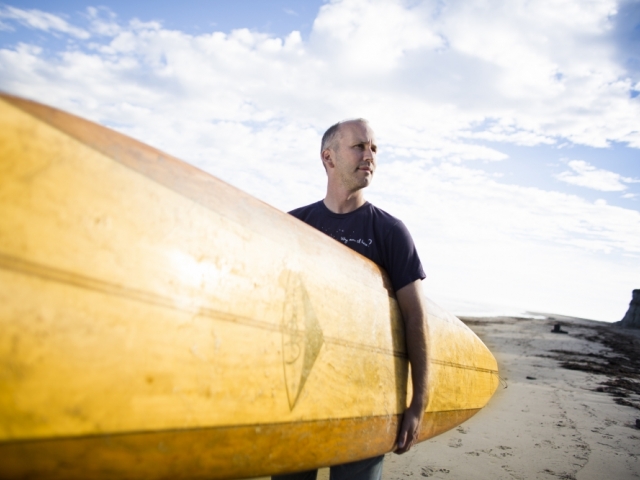 Ben Halpern with surfboard