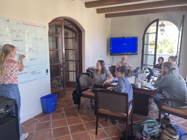 A group of scientists collaborating in a conference room 