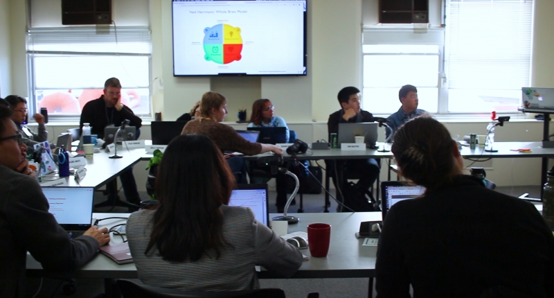 researchers discussing in meeting room