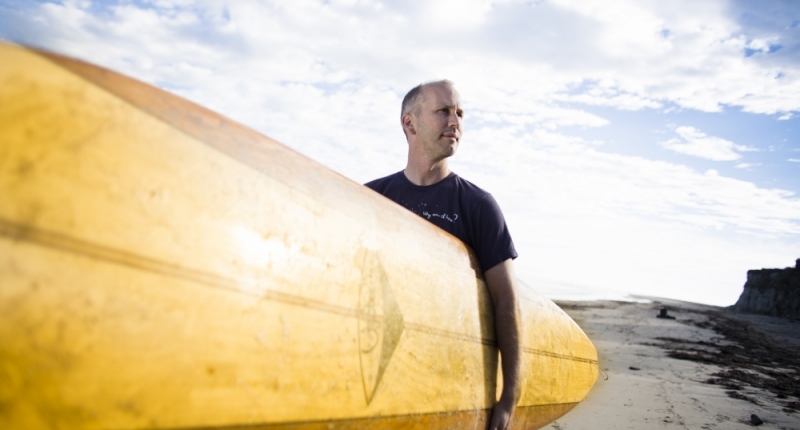 Ben Halpern with surfboard