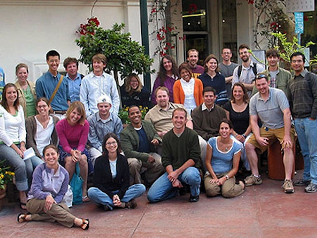 A group of people posing for the camera